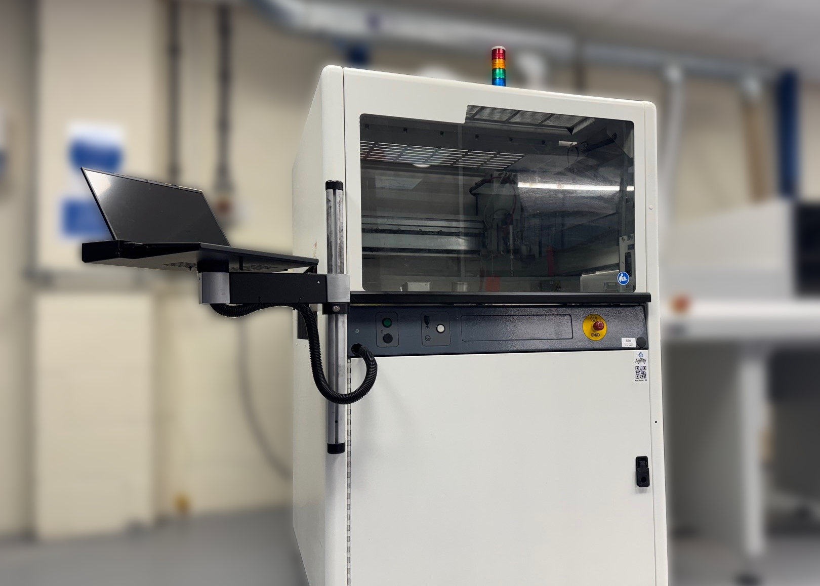 A machine for conformal coating in a production setting